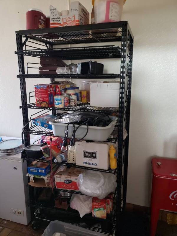 lot 3106 image: Storage rack and contents