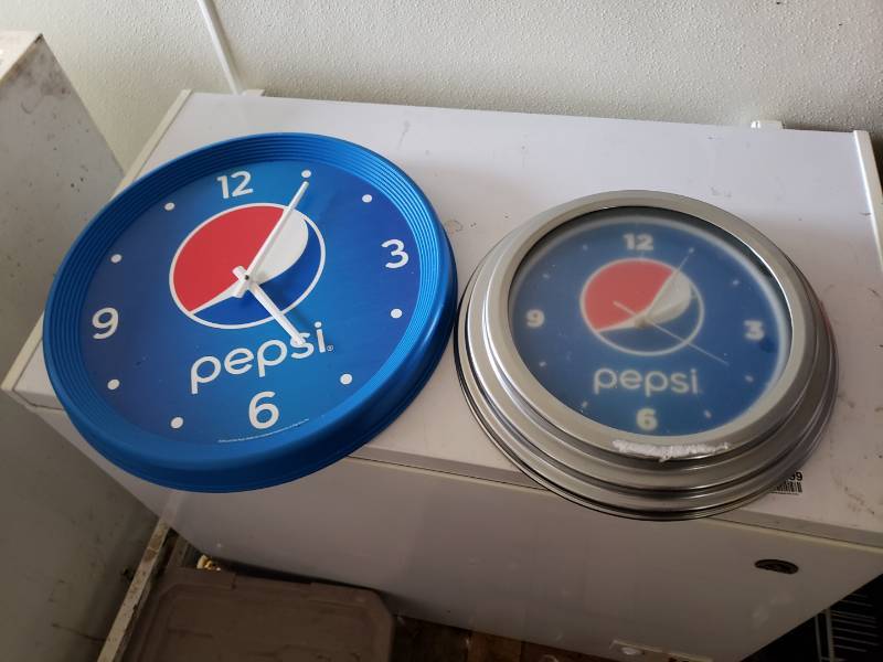 lot 3107 image: Pair of Pepsi Wall Clocks