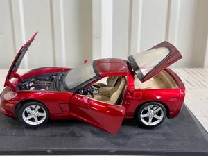 lot 29 image: Die-cast Red Sports Car Model with Opening Doors and Hood