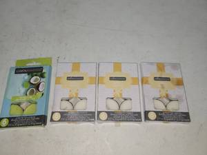 lot 64 image: LUMINessence Scented Tea Candles 4-Pack Vanilla Coconut Lime