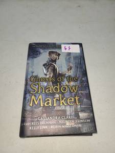 lot 66 image: Ghosts of the Shadow Market by Cassandra Clare, Sarah Rees Brennan, Maureen Johnson, Kelly Link, Robin Wasserman