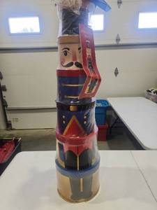 lot 22 image: Holiday Gift Tower Stacking Nutcracker Decorative Set