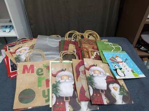 lot 1111 image: LOT OF RANDOM CHRISTMAS GIFT BAGS
