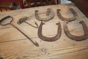 lot 2573 image: Antique Hay Hooks and Horseshoes