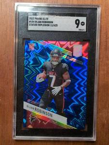 lot 4003 image: 2023 Panini Elite #104 Bijan Robinson Status Explosion 11625 SGC 9