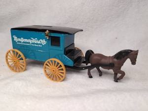 lot 7018 image: Montgomery Ward Co. Horse-Drawn Delivery Wagon Coin Bank