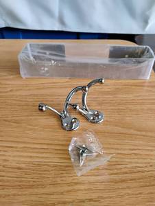 lot 1522 image: Polished Chrome Towel Hooks with towel holder and Mounting Hardware Set of 2