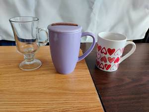 lot 1545 image: 3-Piece Drinkware Lot Glass Mug, Purple Tea Mug with Lid, Heart Print Mug