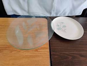 lot 1552 image: Round Glass Plate with Frosted Leaf Design and Oval White Floral Serving Platter 2-Piece Lot