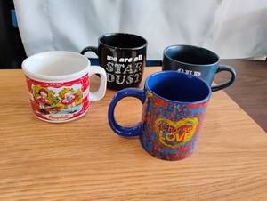 lot 1557 image: Lot of 4 Ceramic Coffee Mugs with Campbells, Choose Love, and Starbucks