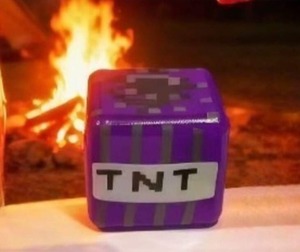 lot 2220 image: Minecraft TNT-themed slow-rising squishy toy or squeeze ball.
