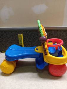 lot 35 image: Fisher-Price Crawl Around Baby Walker Toy with Activity Features