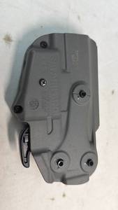 lot 38 image: Safariland Paddle Holster
