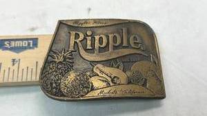 lot 73 image: Ripple Wines Brass Belt Buckle by Lewis Buckles