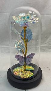 lot 82 image: Iridescent Plastic Rose with Butterfly in Glass Dome Display