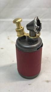 lot 91 image: Cylinder Table Lighter with Red Wrapped Body Brass Knurled Striker and Metal Snuffer
