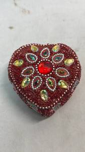 lot 97 image: Red Heart-Shaped Jeweled Trinket Box with Plastic Stone Embellishments