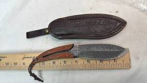 lot 198 image: Fixed Blade Knife with Feather-Etched Blade and Leather Sheath