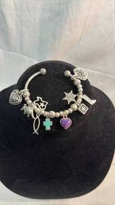 lot 215 image: Charm Bracelet with Beads and Decorative Charms