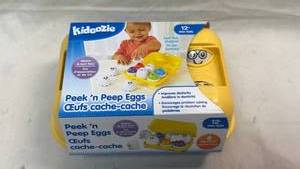 lot 318 image: Kidoozie Peek n Peep Eggs Catch Caddie 12 Months