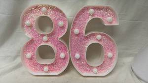 lot 338 image: Number 86 Marquee Sign Pink Glitter with White Pearl Bulbs 2-Piece Set