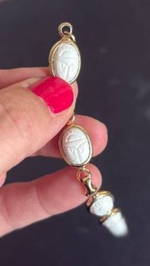 lot 1020 image: Gold-Tone Bracelet with Oval Carved Scarab Beetle Links