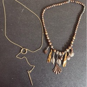 lot 1021 image: 2 Necklaces Beaded with Metal Charms and Pendants and Gold Tone