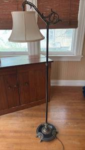 lot 1041 image: Vintage Floor Reading Lamp with Ornate Black Metal Base and Cream Bell Shade approximately 56 inches tall