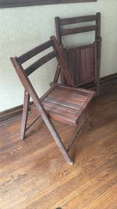 lot 1048 image: 2 Folding Chairs Wood Slat Seat Back