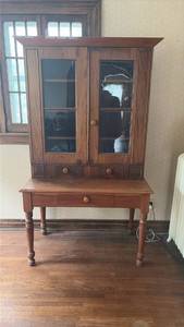 lot 2020 image: Two-Part Wood Cabinet with Glass Doors and Base Table, Adjustable Shelves, Wavy Glass