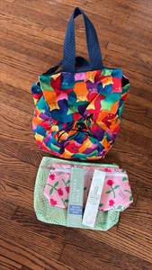 lot 2031 image: Colorful Insulated Sling Mini Backpack, Cosmetic Pouches and Skincare Products Bundle