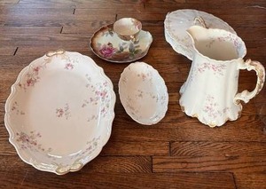 lot 2033 image: Haviland Limoges and Unbranded Rose Themed Patterns Porcelain Bundle. Soup Tureen, Pitcher, Serving Platter, Relish Dish and Tea Cup with Matching Cake Saucer