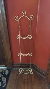 lot 2052 image: Metal Decorative Rack with Scrolled Finials and Plate or Pot Lid Hangers Approximately 41 Inch Long