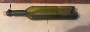 lot 4036 image: Green Glass Wine Bottle Cut In Half Serving Dish