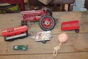 lot 2585 image: Vtg. Hubley Toy Tractor and More