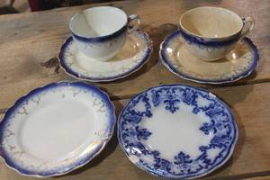 lot 2658 image: Antique Flow Blue Cups & Saucers some chips