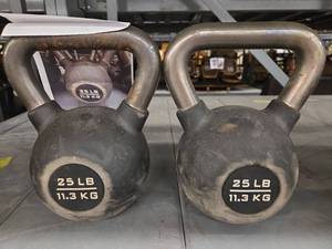 lot 1312 image: Hammer Strength 25 LB Kettlebells - Set of 2