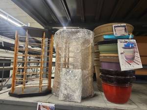 lot 4043 image: Wooden Rotating Sunglass Display Rack with Decorative Pots