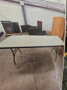 lot 4132 image: Folding Table with White Top and Black Metal Frame