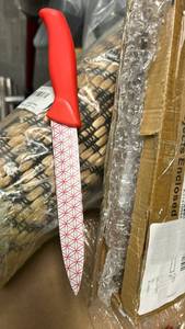 lot 11004 image: Kitchen Knife Red Handle Geometric Pattern Blade