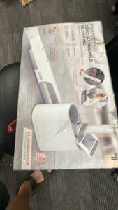 lot 16032 image: Sharper Image Cordless Handheld Vacuum Pro with Charging Dock
