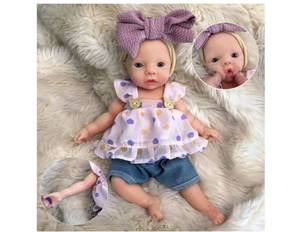 lot 5491 image: Full Body Silicone Reborn Baby Doll, Eyes Open Realistic Lifelike Full Silicone Body Baby Girl STYLE MAY VARY - Retail $120
