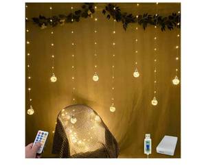 lot 5495 image: YOLIGHT Wishing Ball Curtain Lights 200 LED Window Curtain String Lights with Remote, USB Battery Powered Twinkle Globe Fairy Lights for Wedding Party Bedroom Christmas Decoration (Warm White) - Retail $20