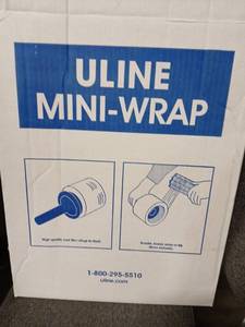 lot 5526 image: Uline Mini-Wrap 8 Rolls Clear Stretch Film with Dispenser