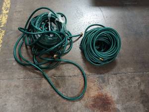 lot 5547 image: Garden Hoses 2 Count Green Coiled 100 ft Each