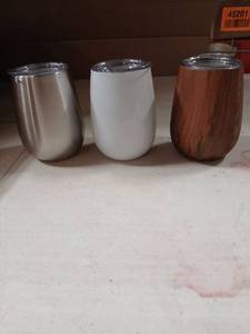 lot 5555 image: 10 oz Stemless Stainless Steel Wine Cups with Vacuum Lids. Individually Wrapped Lot of 24.  9Faux Wood, 7 White, 8 Silver