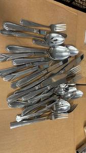 lot 218 image: Flatware with Decorative Handles - Retail $25