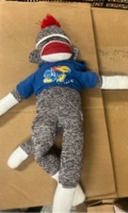 lot 227 image: University of Kansas Jayhawks Sock Monkey Plush Toy