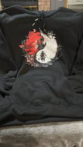 lot 301 image: Black Anime Pullover Hoodie with Red and White Graphic Print Size M