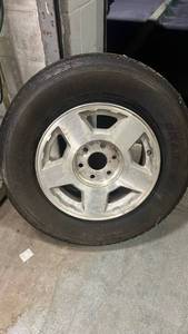 lot 317 image: General Grabber NS 25570R17 Tire on 5-Lug Alloy Wheel